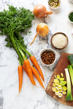 Carrots, onions, rice, leek, sultanas