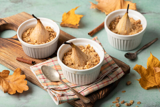 Pear crumble with almonds in autumn setting