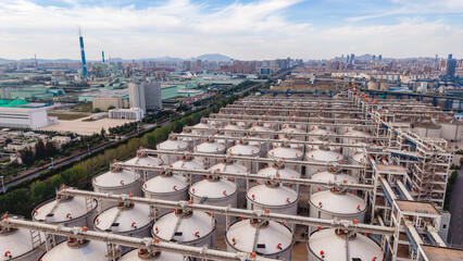 rows of large industrial storage tanks in factory © Zhaorui