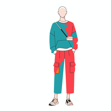 Fashionable young man in trendy modern streetwear outfit with cargo pants and sneakers