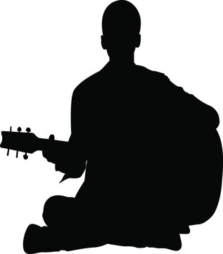 Silhouette of Seated Man Playing Guitar for Music Lesson Apps