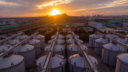 Aerial View of Inland Grain Silo Base at Sunset © Zhaorui