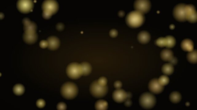 Seamless loop of golden glittering bokeh particles floating on a dark background.