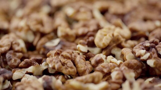 Walnut kernels isolated on white background. Walnuts close-up. Healthy eating. Half of walnut isolated. Peeled walnut on white.	

