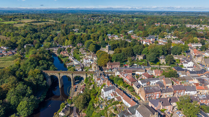 Aerial Photo Knaresborough. Knaresborough is a market and spa town and civil parish on the River Nidd in North Yorkshire, England. It is three miles (five kilometres) east of Harrogate  © Brian