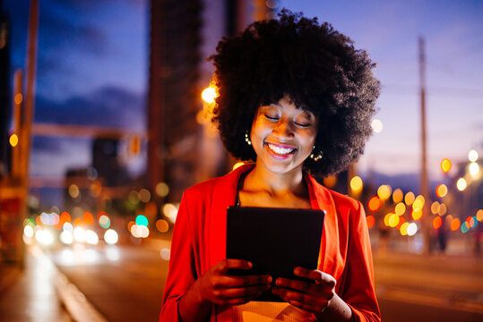 Beautiful young black woman outdoors in the city