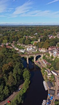 Aerial Video Knaresborough. Knaresborough is a market and spa town and civil parish on the River Nidd in North Yorkshire, England. It is three miles (five kilometres) east of Harrogate 