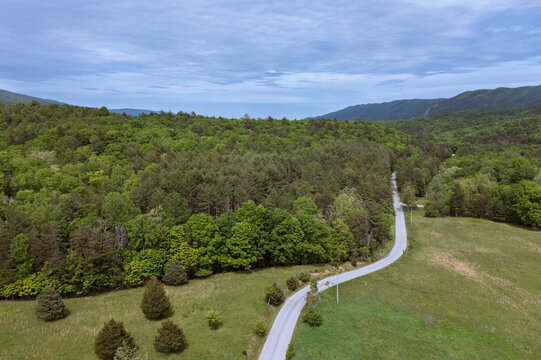 Aerial view of empty road crossing landscape