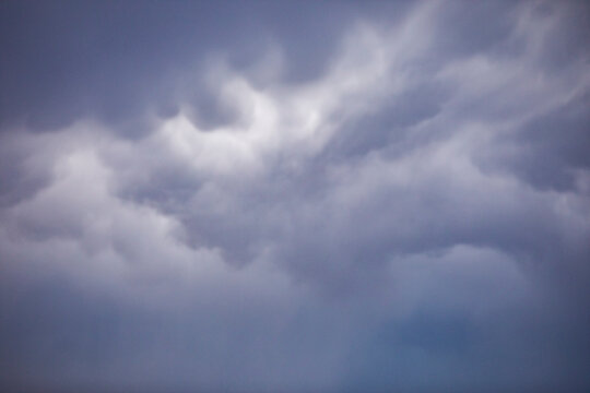 Thick gray sensuous storm clouds