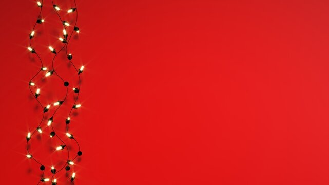 Christmas Lights Garland Border on Red Background Copy Space
