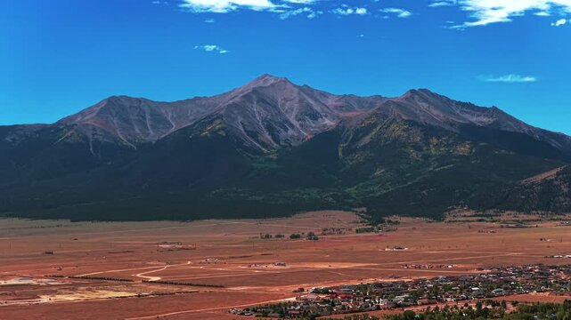 Aerial Drone view Collegiate Peaks Cottonwood Pass Rocky Mountains Buena Vista Nathrop Colorado landscape Mount Princeton Yale Sawatch Range summer autumn fall blue sky morning landscape upwards USA