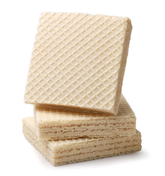 Square wafers are stacked on top of each other on a white. Isolated