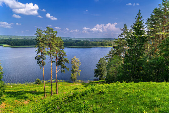 View of Linkmenas lake from Ladakalnis hill in Aukstaitija National Park, Lithuania. Daytime shot of scenic nature