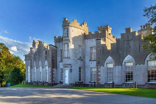 Sea facing facade of Ardgillan Castle in County Dublin, Ireland. Daytime view showcasing historic castle architecture