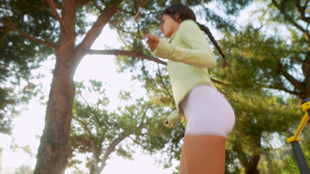 Woman Raises Bent Elbow During Side View Stretch