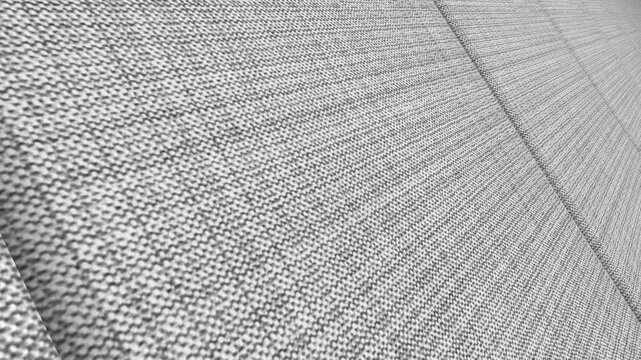 Graceful Cinematic Movement Along Italian Light Gray Wool Silk Fabric with Angled Camera View, Elegant Lighting and Delicate Textile Surface Details