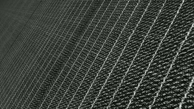 Polished Cinematic Movement Along Italian Charcoal Gray Pinstripe Twill Wool Fabric with Angled Camera Perspective, Elegant Lighting and Fine Woven Patterns