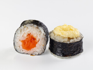 Sushi roll with salmon and cream topping on white background representing Asian food © Andrei Starostin