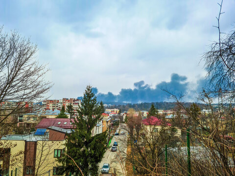 Smoke plume rising over city after military attack in Lviv, Ukraine