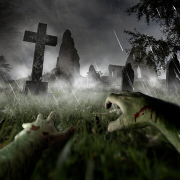 Personal perspective of a zombie's blood-stained hands in a spooky cemetery during a heavy downpour with stone crosses, tombstones and an ancient ruined church in the background