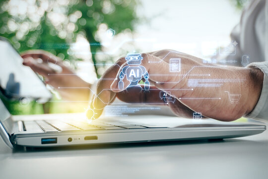 Businessman typing on laptop with digital AI chatbot robot interface and automated business icon network in outdoor setting, concept of artificial intelligence innovation and future tech.