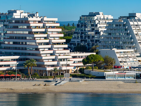 Aerial view of La Grande-Motte pyramidal architecture and Mediterranean coastline in south France 