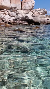 Vertical view of crystal clear turquoise water off the coast of Spargi Island in the La Maddalena Archipelago, Sardinia, Italy