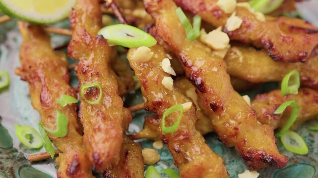 Grilled Chicken Satay Skewers with Peanuts, Spring Onions and Lime