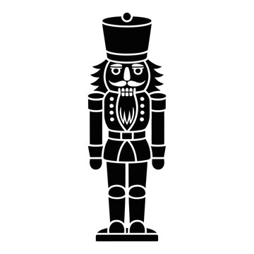 A detailed nutcracker soldier stands in a black silhouette
