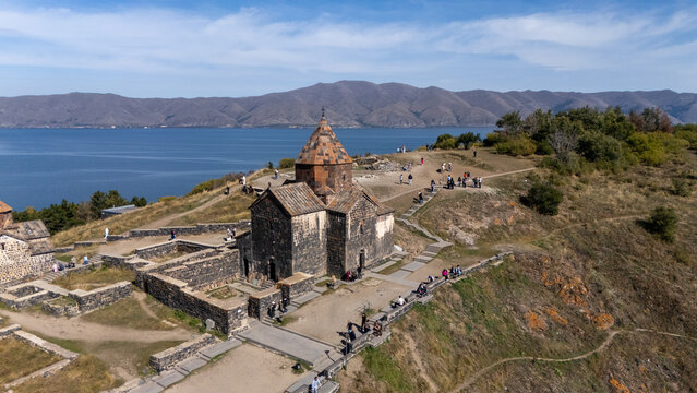 Sevan Lake and Sevanavank oldest church. Mountains country Armenia. Aerial view from above by drone. Stock Photo