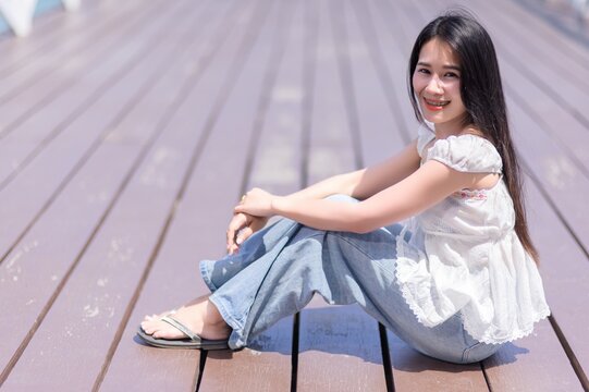 Young Woman Enjoying Relaxing Moment on Koh Si Chang Island