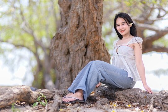 Young Woman Enjoying Summer Vacation on Koh Si Chang Island