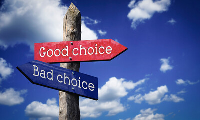 Good or bad choice - wooden signpost with two arrows, sky with clouds © PX Media
