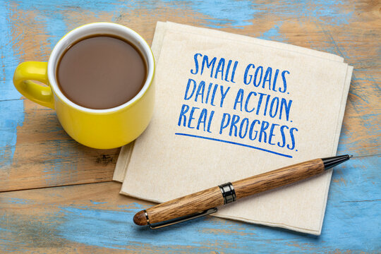 Small goals. Daily action. Real progress. Concept of setting achievable goals, building daily habits, taking consistent action, and making steady progress through small steps and persistent effort.