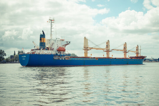Swinoujscie, West Pomeranian - Poland - June 13, 2021: Bulk carrier ship Allegra using to transport goods and products. Cranes in port Swinoujscie