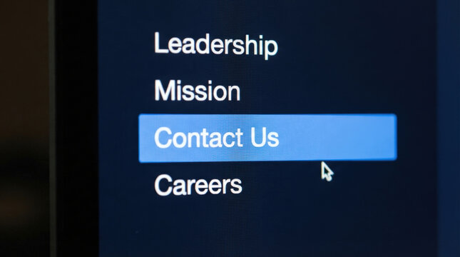 Computer menu navigation with selected contact us option highlighted in blue featuring white text on dark background for website.