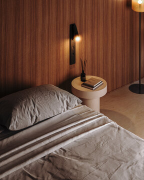 Close-up of bedroom interior with warm lighting, 3d render