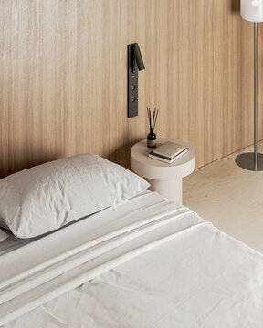 Minimalist bedroom with wooden wall, white bedding and bedside table