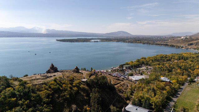 Sevan Lake and Sevanavank oldest church. Mountains country Armenia. Aerial view from above by drone. Stock Photo