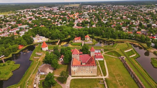 Wide aerial drone view of Kuressaare Episcopal Castle and star bastion moat in Saaremaa Estonia