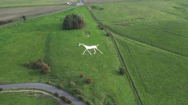 Travel and History: Aerial 4K Drone View of Historic Hackpen White Horse Chalk Hill Figure on Marlborough Downs in Wiltshire