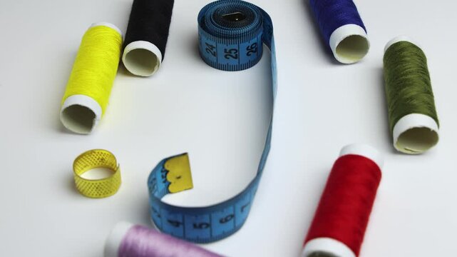 Sewing Thread Spools and Tape Measure Flat Lay