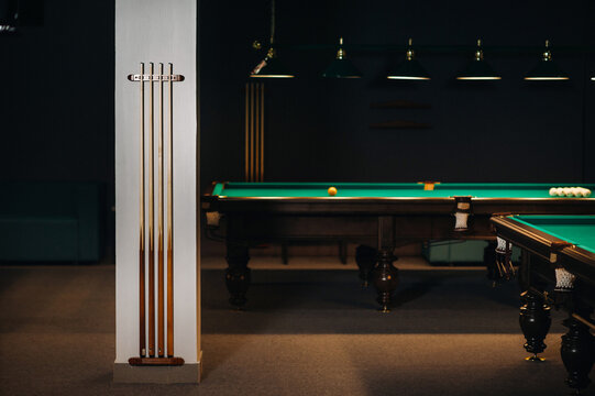 Billiard cue in the game club.Billiard club