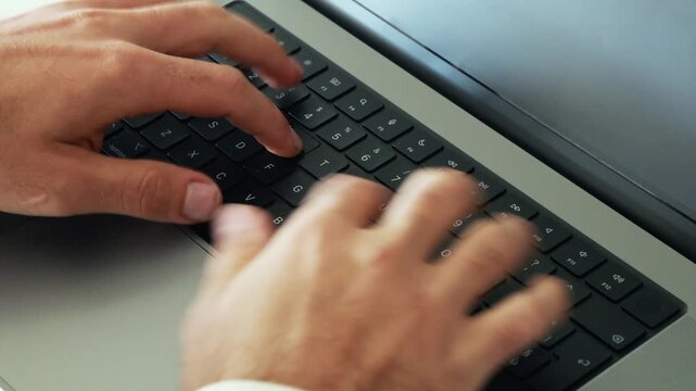 Close up of generic laptop keyboard with command key visible on clean modern desk workspace