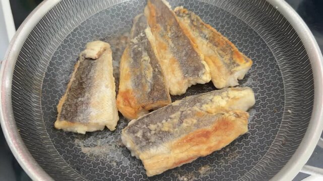 Fried fish fillets whitefish hake seafood pescatarian diet healthy eating, nutritious meals delicious appetizers, fresh ingredients gourmet cuisine, traditional dishes food background top view copy sp