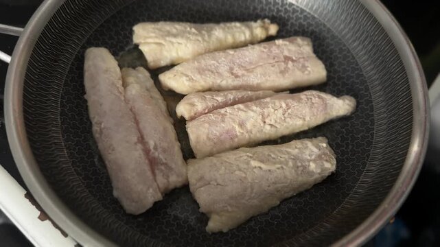Fried fish fillets whitefish hake seafood pescatarian diet healthy eating, nutritious meals delicious appetizers, fresh ingredients gourmet cuisine, traditional dishes food background top view copy sp