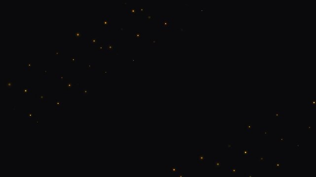Golden light particles floating on black background motion background