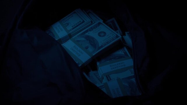 Money Bag Is Zipped Up And Taken In The Dark
