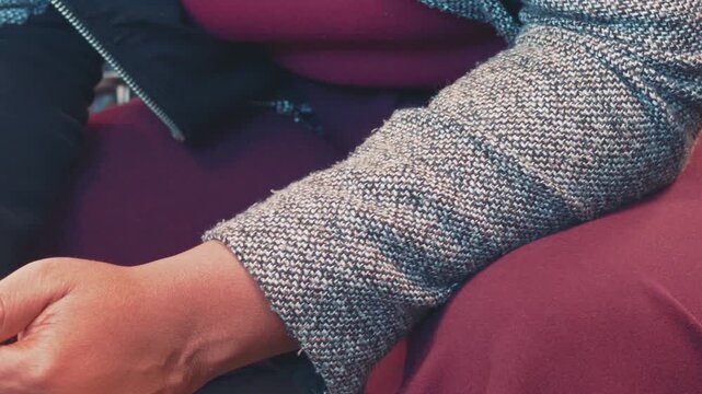 Close Up of Passenger Hands Typing on Smartphone Holding Travel Passports