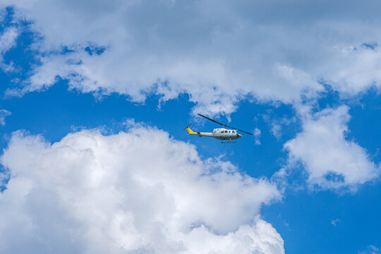 Helicopter Flying Through Dramatic Clouds Over Sandy Hook, New Jersey
